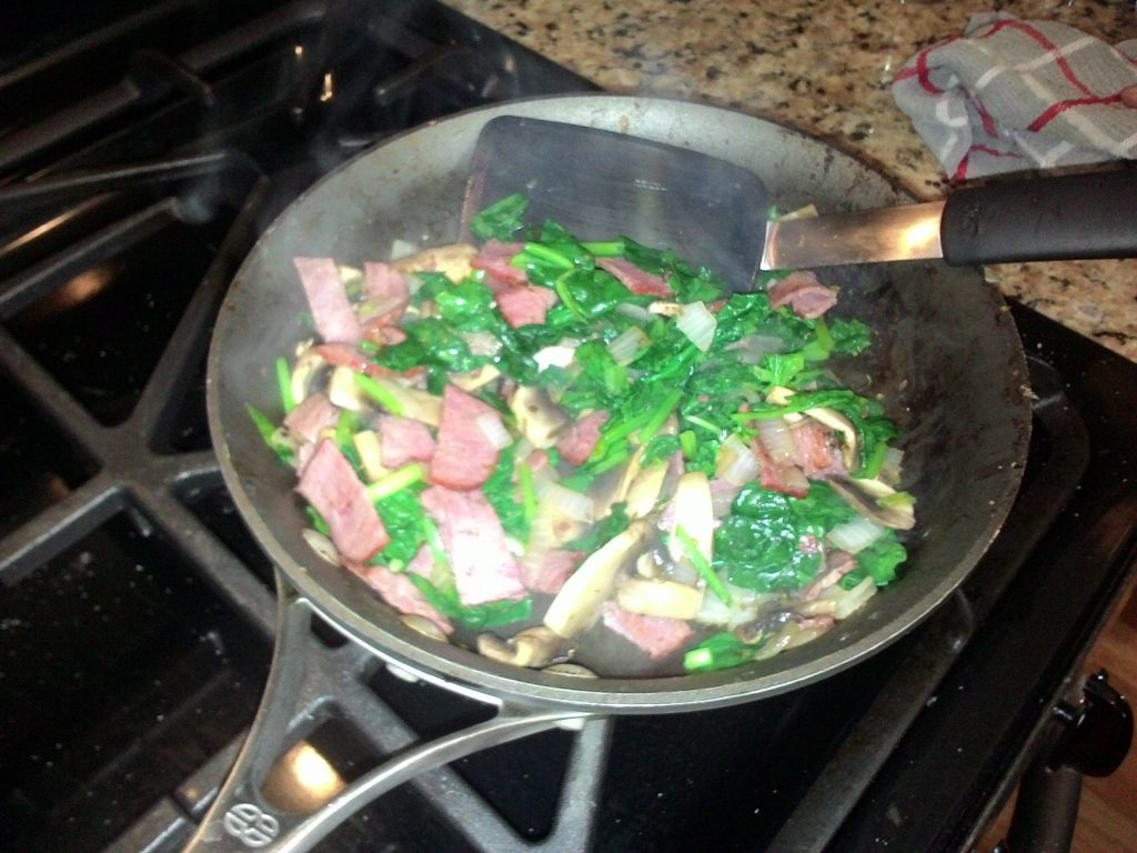 Turkey bacon, onions, mushrooms, and spinach.
